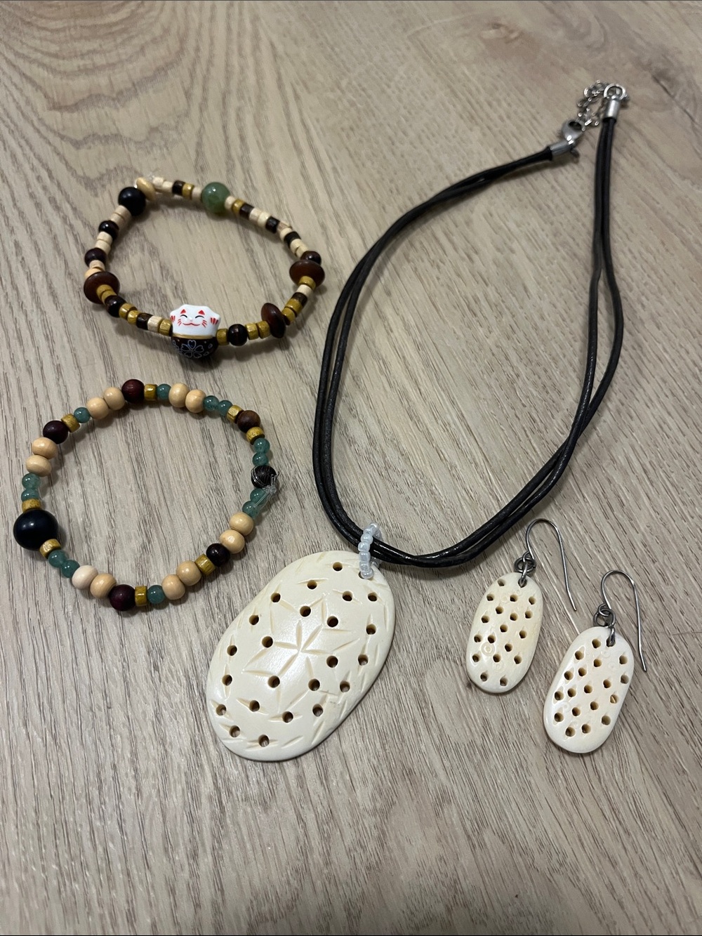 Hand-Carved White Pendant Necklace and Earring Set with Beaded Bracelets